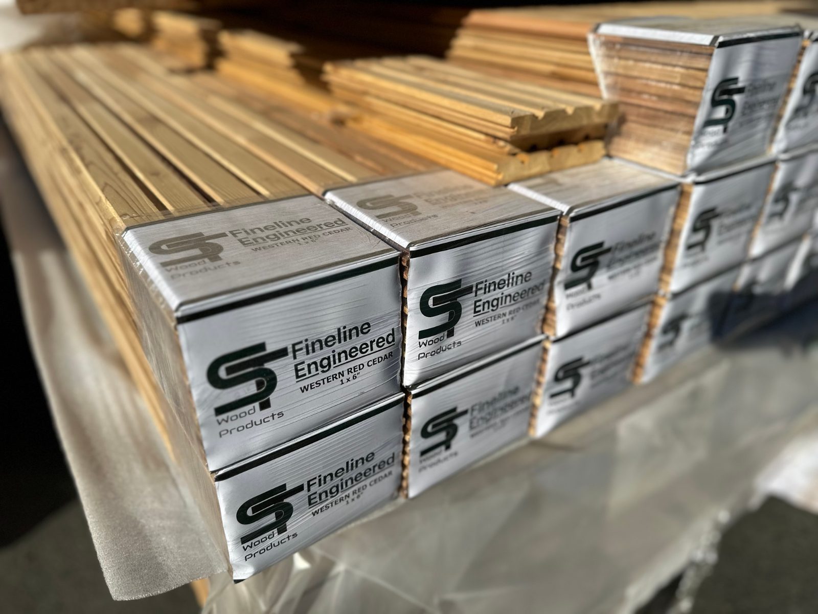 Wrapped bundles labelled ST Wood Products Fineline Engineered Western Red Cedar 1x6