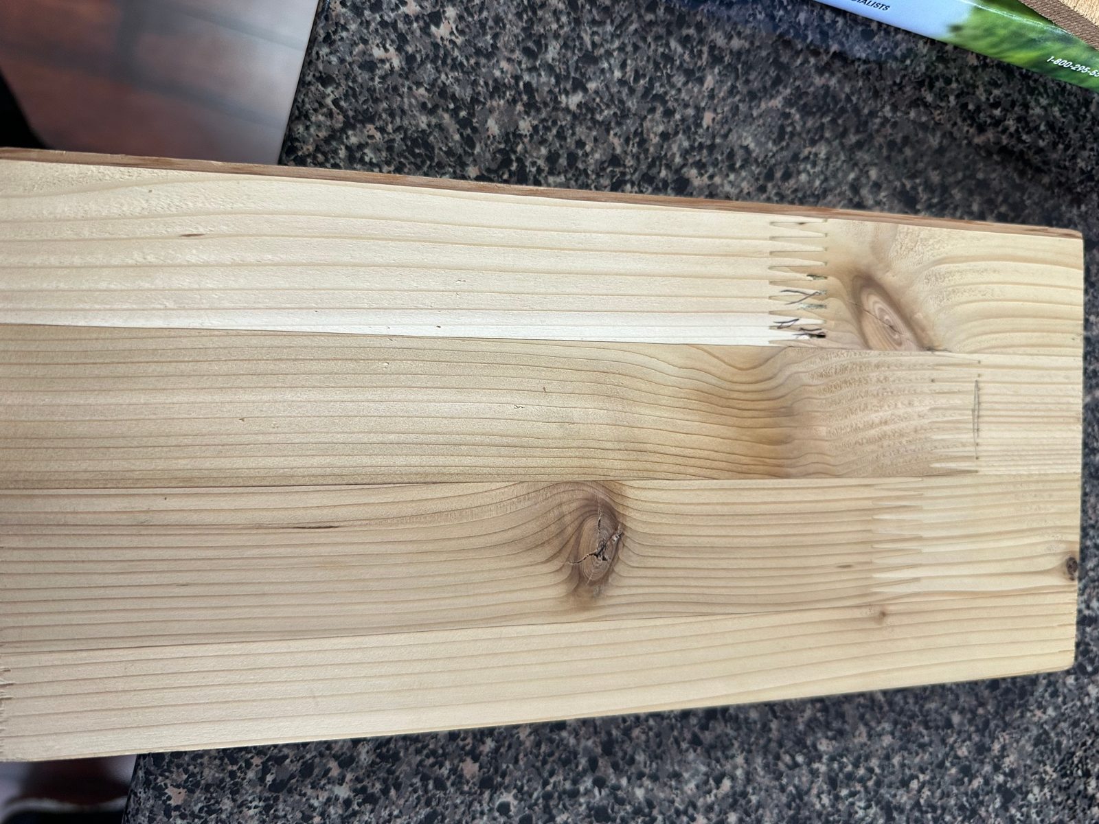 Close-up of finger joints between core lamellas in the cedar laminate